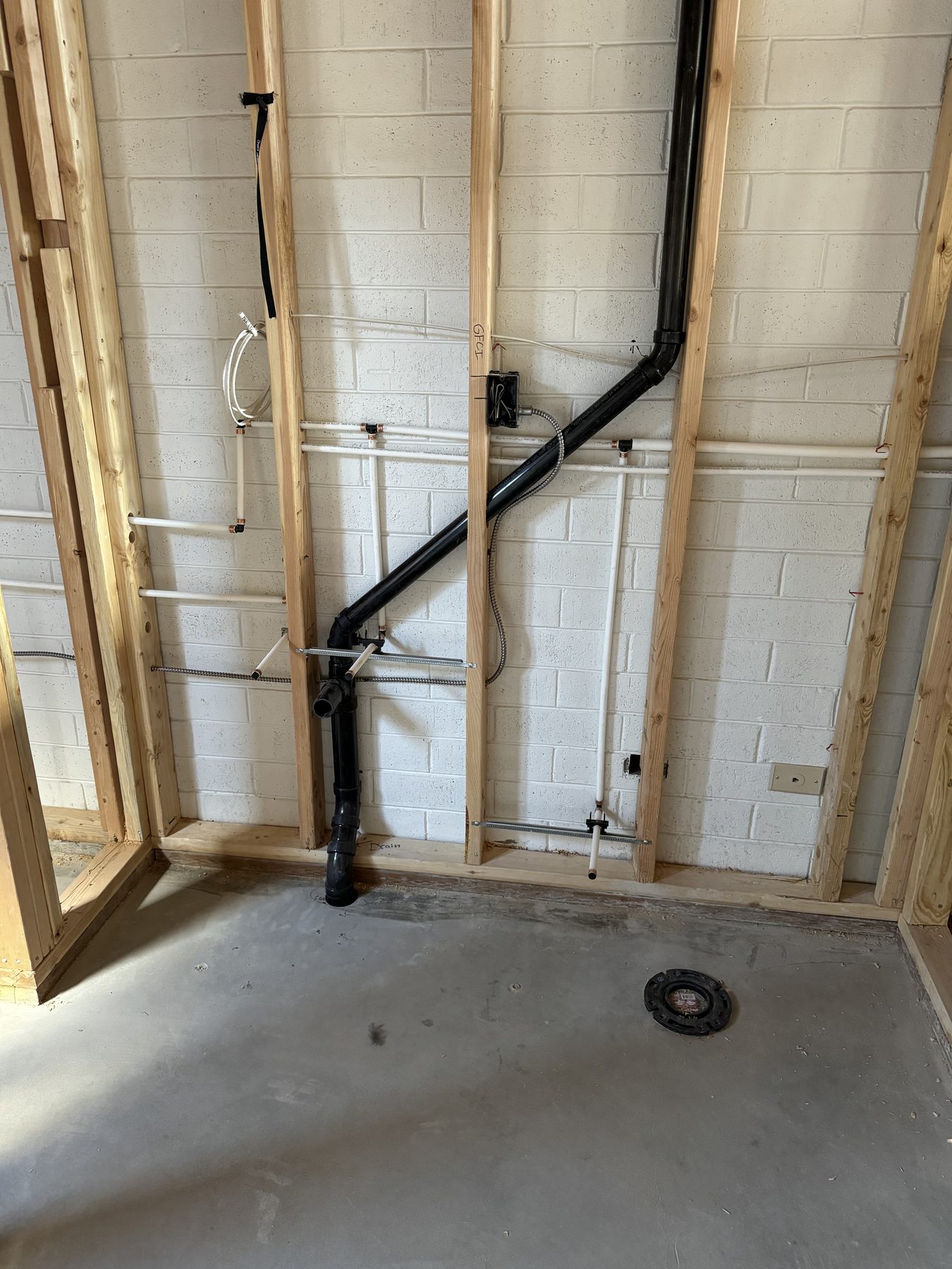 Licensed plumber from Abbott Plumbing & Drain working on a residential plumbing repair in Tooele, Utah